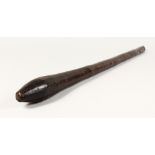 AN ABORIGINE WOODEN CLUB. 30ins long.