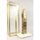 A GOOD BIG BEN PIERCED BRASS SKELETON CLOCK, in a glass case. 2ft high.