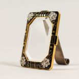 A SMALL CONTINENTAL .935 SILVER AND ENAMEL FRAME, set with diamonds. 5cms x 3.5cms.