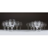 A SET OF EIGHT CUT GLASS WINE GLASSES and nine smaller wine glasses (17).
