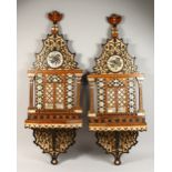A RARE PAIR OF TURKISH TURBAN STANDS, inlaid with coloured woods and mother-of-pearl. 3ft 4ins