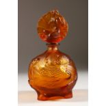 A GOOD ART DECO GLASS PERFUME BOTTLE AND STOPPER, the body with fish in relief, the stopper a nude