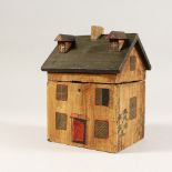 A PAINTED HOUSE TEA CADDY. 6ins.