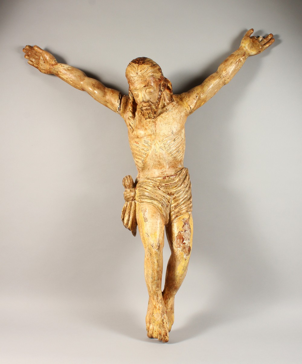 A 17TH-18TH CENTURY ITALIAN CARVED WOOD, GILDED AND PAINTED CORPUS CHRISTI. 3ft 2ins long.