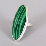 A SILVER AND MALACHITE RING.