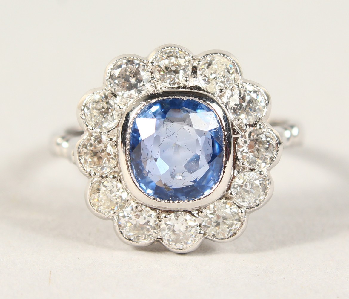 AN 18CT WHITE GOLD GOOD SAPPHIRE AND DIAMOND RING of 2.6cts approx.