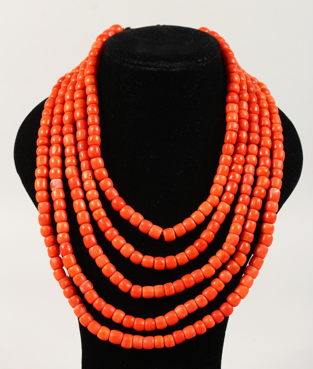 A GOOD FIVE ROW CORAL NECKLACE with 18ct gold clasp.