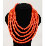 A GOOD FIVE ROW CORAL NECKLACE with 18ct gold clasp.