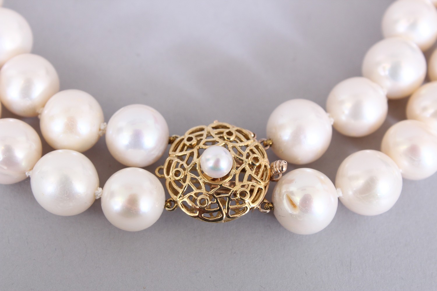 A FINE CULTURED PEARL DOUBLE ROW NECKLACE with 18ct yellow gold clasp. - Image 2 of 4