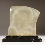 AN ART DECO FROSTED GLASS PLAQUE on a marble base, a young lady smelling a rose. 9.`5ins high x 8ins