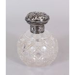 A CUT GLASS SCENT BOTTLE, with silver top and band. Birmingham 1907.