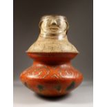 A GOOD PERUVIAN SHIPIBO CULTURE TWO-TIER CIRCULAR POTTERY POT, with a face. 44cms high x 33cms