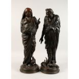 A GOOD PAIR OF 19TH CENTURY FRENCH BRONZES OF ROMAN FIGURES with game at their feet, on circular