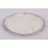 A PIE CRUST SALVER, on three tiny feet. 10ins diameter. Sheffield 1902. Maker: Atkin's Bros.