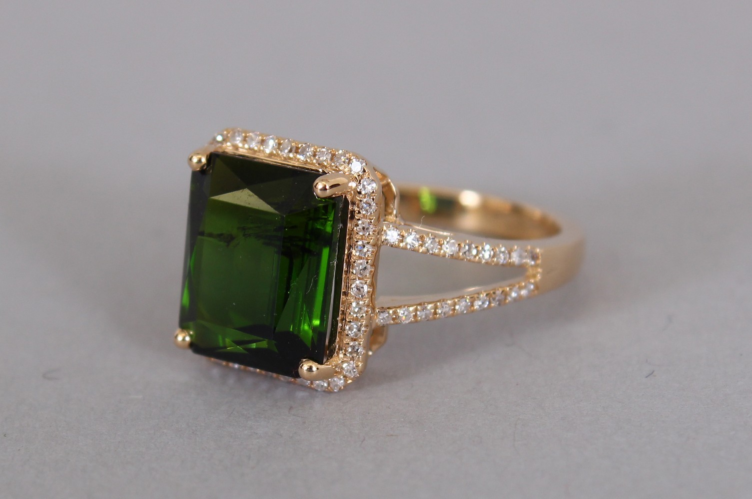 A 14CT YELLOW GOLD AND DIAMOND RING set with an emerald cut green tourmaline approx. 5.19cts. - Image 2 of 3