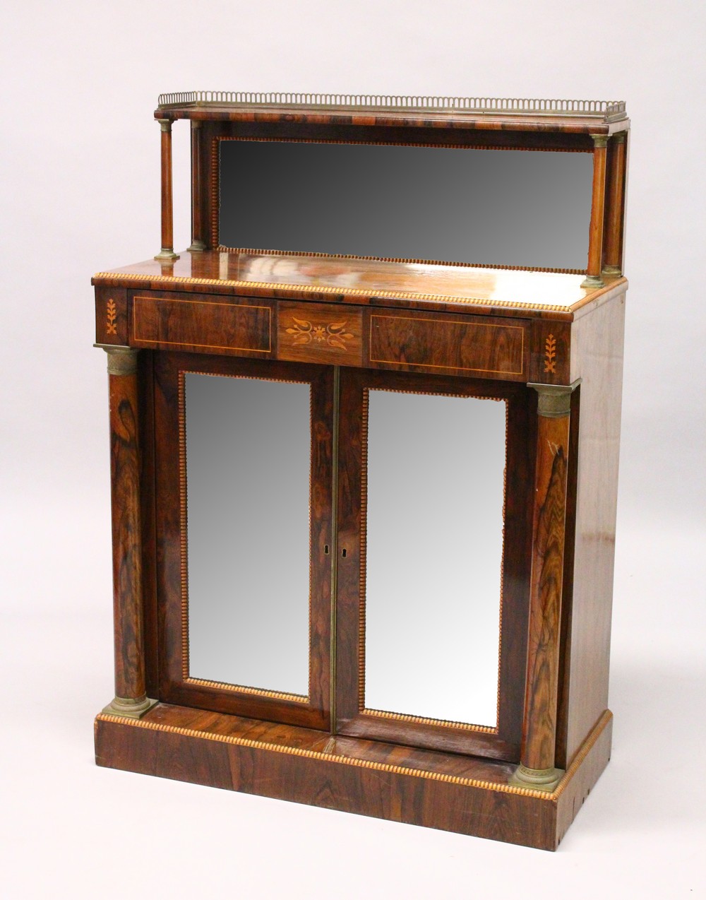 A REGENCY ROSEWOOD CHIFFONIER, brass galleried mirror back, upper shelf, single frieze drawer over a