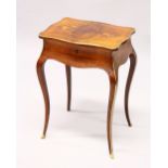 A CENTURY FRENCH ROSEWOOD AND MARQUETRY WORK TABLE, the rising top inlaid with a bird and flowers,