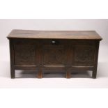 AN 18TH CENTURY OAK DOWER CHEST, with two plain panels to the top, carved frieze and three carved