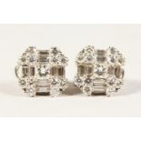 A SUPERB PAIR OF 18CT WHITE GOLD AND DIAMOND EARRINGS.