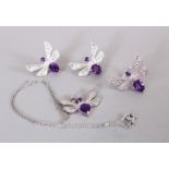 A SILVER AND AMETHYST SET BUTTERFLY PENDANT, RING AND EARRINGS.