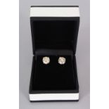 A PAIR OF 18CT WHITE GOLD DIAMOND STUD EARRINGS of 2.73cts.