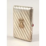 A RUSSIAN SILVER CIGARETTE CASE, CIRCA. 1910, with gold initials.