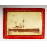 A FRAMED PHOTOGRAPH OF H.M.S. VICTORIOUS.