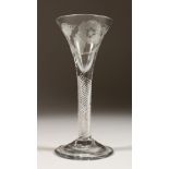 A JACOBITE WINE GLASS, the bowl engraved with rose, rosebud and oak leaves. 6ins high.