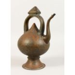 A RARE 18TH CENTURY OR EARLIER ISLAMIC PERSIAN SAFAVID BRASS EWER, with hinge in the handle, the