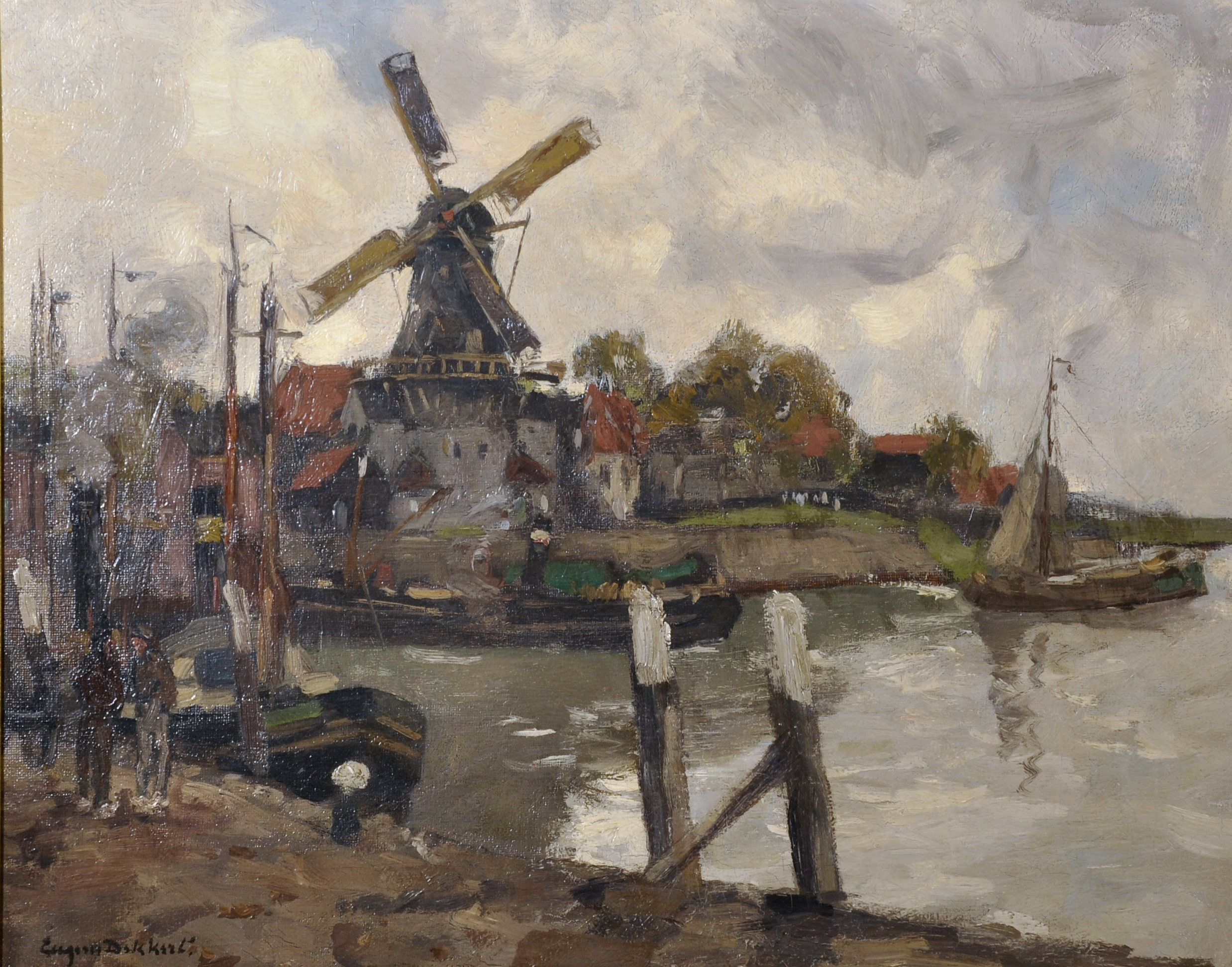Eugene Dekkert (1865-1956) German. Figures on a Quayside with a Windmill in the distance, and Barges