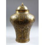 A 19TH CENTURY MAMLUK REVIVAL DAMASCUS SILVER INLAID LIDDED JAR AND COVER, decorated with figures,