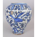 A QAJAR BLUE AND WHITE VASE, PERSIA, 19TH CENTURY, underglaze painted fritware, the sides painted