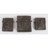 THREE COPPER AMULETIC PLAQUES, TIBET, PROBABLY EARLY 20TH CENTURY, each of rectangular form with