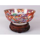AN 18TH CENTUREY CHINESE MANDARIN BOWL, painted with panels of figures and vignettes of birds etc.
