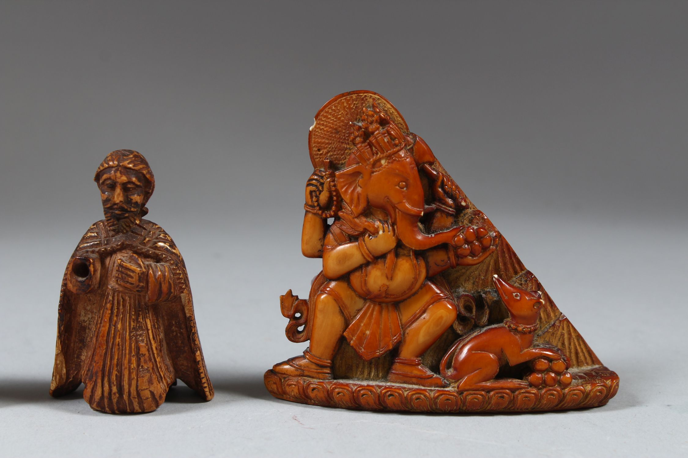 A COLLECTION OF FOUR 17TH-18TH CENTURY SOUTH INDIAN CARVED IVORY PIECES. Depicting Ganesha, - Image 3 of 4