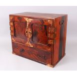 A 19TH CENTURY JAPANESE PARQUETRY CABINET, with double panel doors enclosing 4 drawers over a long