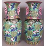 A LARGE PAIR OF CHINESE FAMILLE ROSE PORCELAIN VASES, each decorated with Shou symbols, peach and