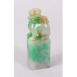A CHINESE CARVED JADE DOG OF FOE. 7cm high.