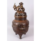 A GOOD LARGE 19TH CENTURY JAPANESE BRONZE KORO AND COVER, with Kylin handles, the sides with