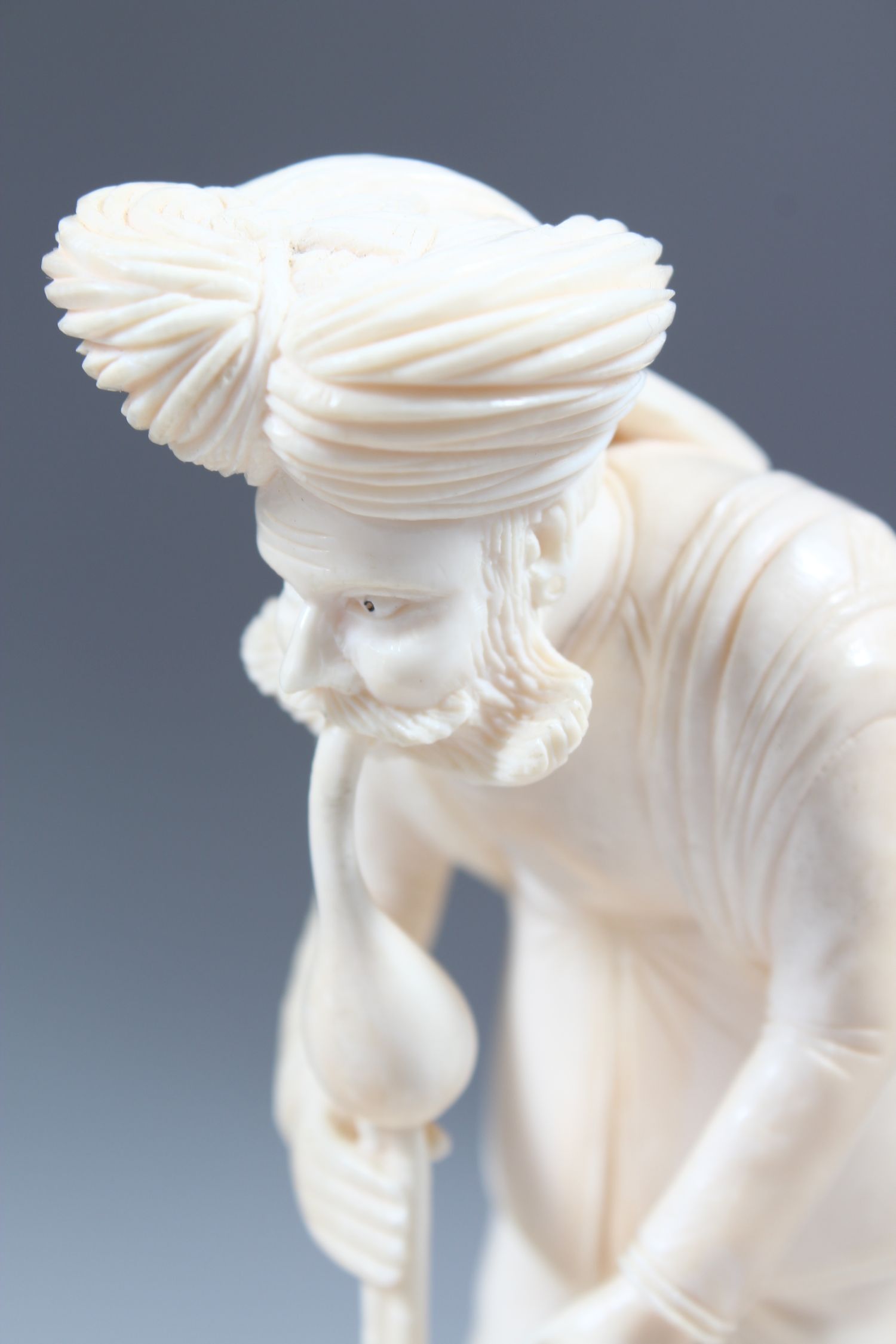 A GOOD 19TH CENTURY INDIAN CARVED IVORY GROUP OF A SNAKE CHARMER with three snakes, standing on a - Image 5 of 7