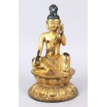 A GILT BRONZE SEATED GOD. 23cm high.