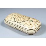 A RARE 19TH CENTURY OTTOMAN SILVER AND GOLD INLAID MARINE IVORY TOBACCO BOX of convex form, 10cm