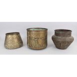 THREE BRASS BOWLS, EGYPT, 20TH CENTURY, each with engraved and repouss figural decoration, with