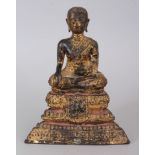 A SMALL LACQUERED GILT BRONZE FIGURE OF A MONK, RATNAKOSIN STYLE, BANGKOK, THAILAND, 19TH CENTURY,