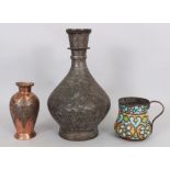 THREE COPPER VESSELS, 19TH CENTURY, comprising a large Persian nargileh bottle with hammered leaf