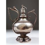 AN 19TH CENTURY MUGHAL INDIAN SILVER WINE VESSEL, 15cm high.