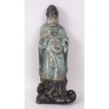 A CHINESE POTTERY FLAT BACK FIGURE OF A SAGE, turquoise paint. 31cm high.