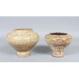 TWO 13TH CENTURY PERSIAN KASHAN POTTERY LUSTRE VASES of flared form, 13cm high, 15cm diameter and