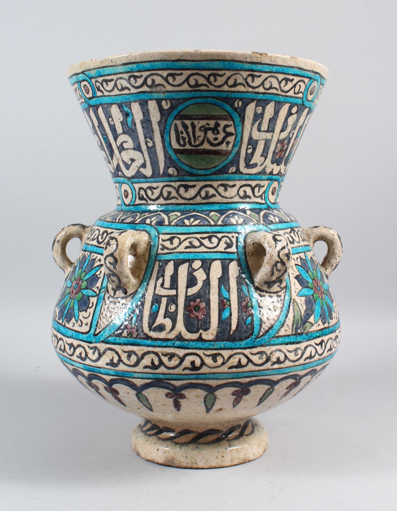 A 19TH CENTURY DAMASCUS STYLE POTTERY MOSQUE LAMP OF MAMLUK FORM, with one handle, notch and