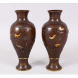 A GOOD PAIR OF JAPANESE BRONZE AND MIXED METAL ONLAID VASES, mixed metal onlaid cranes amidst native
